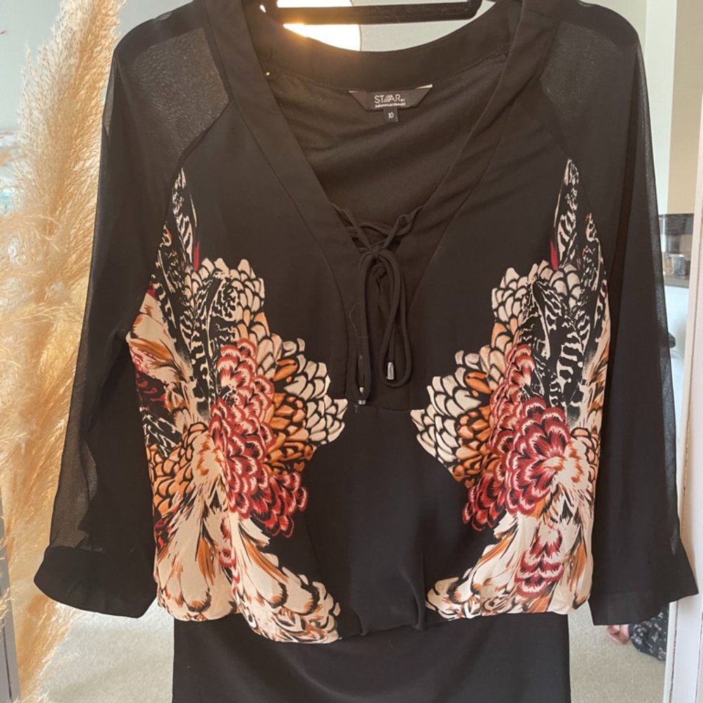 Black blouse with floral pattern